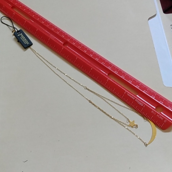 14k yellow gold moon and star necklace - Picture 2 of 3